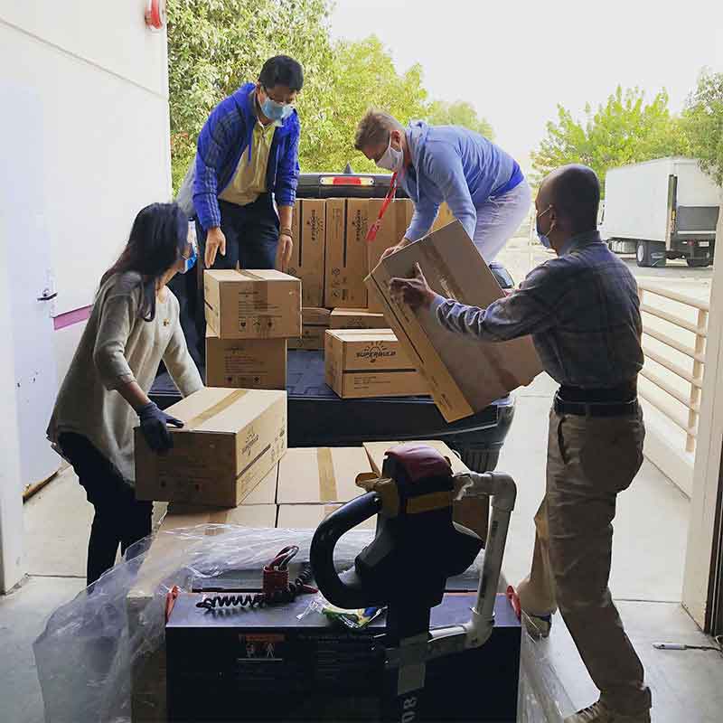 IMEXORA global trade team managing shipments